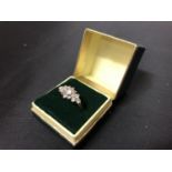 A 9 CARAT GOLD DIAMOND RING