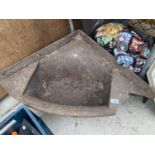 A VINTAGE CAST IRON CORNER TROUGH (SOME DAMAGE)