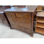 A GEORGE III MAHOGANY CHEST OF TWO SHORT AND THREE LONG DRAWERS