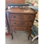Small three drawer chest of drawers on high legs