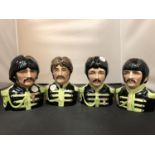 A SET OF FOUR BEATLE TOBY JUGS