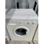 AN INDESIT WASHING MACHINE BELIEVED IN WORKING ORDER - NO WARRANTY