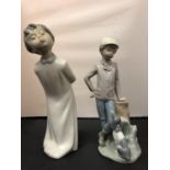 TWO NAO MALE FIGURINES, ONE WITH A DOG