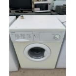 AN INDESIT WG1230 WASHER BELIEVED IN WORKING ORDER - NO WARRANTY