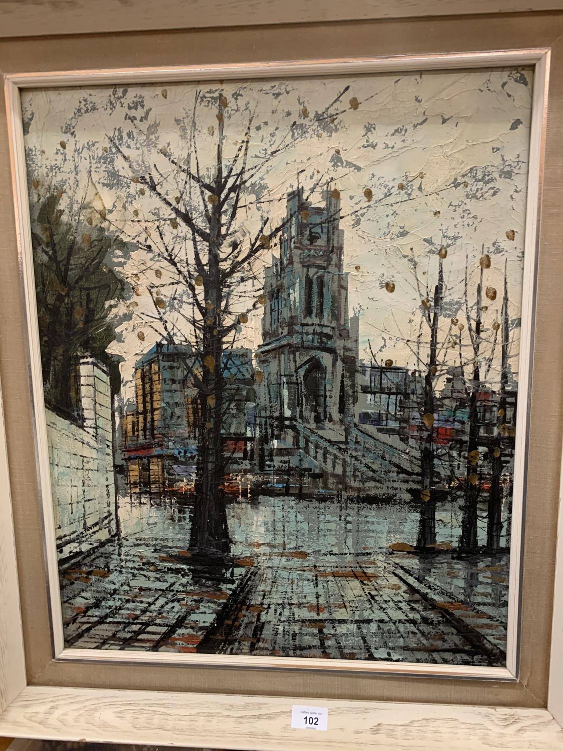 A FRAMED OIL ON CANVAS CITY SCENE