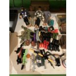 FOUR VINTAGE ACTION MEN AND A LARGE QUANTITY OF ACCESSORIES