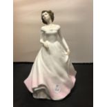 A ROYAL DOULTON WHITE FIGURINE