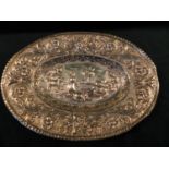 A POSSIBLY CONTINENTAL OVAL DISH DECORATED WITH A PASTORAL SCENE - MAKER WORN, WEIGHT 14 oz