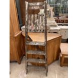 A PAIR OF VINTAGE FOUR RUNG STEP LADDERS