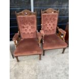 A PAIR OF EARLY 20TH CENTURY LADIES' AND GENTLEMAN'S OAK PARLOUR CHAIRS