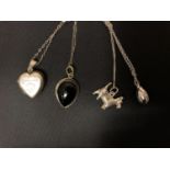 FOUR SILVER NECKLACES