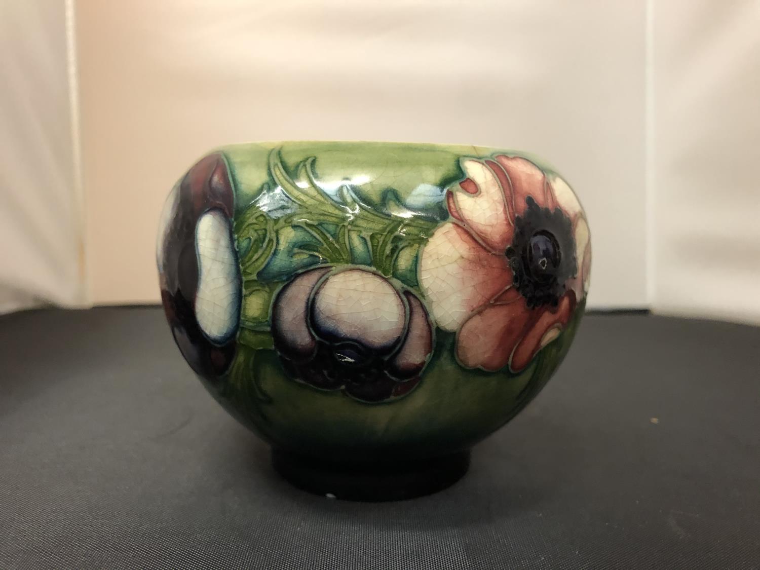 A MOORCROFT VASE ANEMONE DESIGN - SMALL CHIP TO BASE
