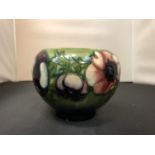 A MOORCROFT VASE ANEMONE DESIGN - SMALL CHIP TO BASE