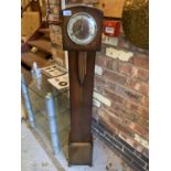 AN ART DECO STYLE GRANDMOTHER CLOCK