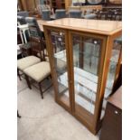 A MODERN 'BATH CABINETS' TWO DOOR DISPLAY CABINET