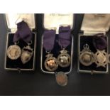 SEVEN VINTAGE MEDALS - SIX BEING HALLMARKED SILVER