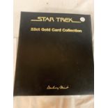 A STAR TREK 22CT GOLD CARD COLLECTION FROM THE DANBURY MINT AND A STAR TREK FACT FILE