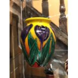 A SIGNED ANITA HARRIS HAND PAINTED TULIPS VASE