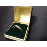 A 9 CARAT GOLD RING WITH SIX DIAMONDS SIZE 0