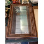 A WALL MOUNTED COLLECTABLES DISPLAY CABINET WITH 4 GLASS SHELVES