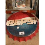 A LARGE PEPSI BOTTLE TOP WALL DISPLAY SIGN