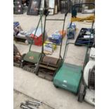 AN ELECTRIC LAWN RAKER AND TWO VINTAGE PUSH MOWERS
