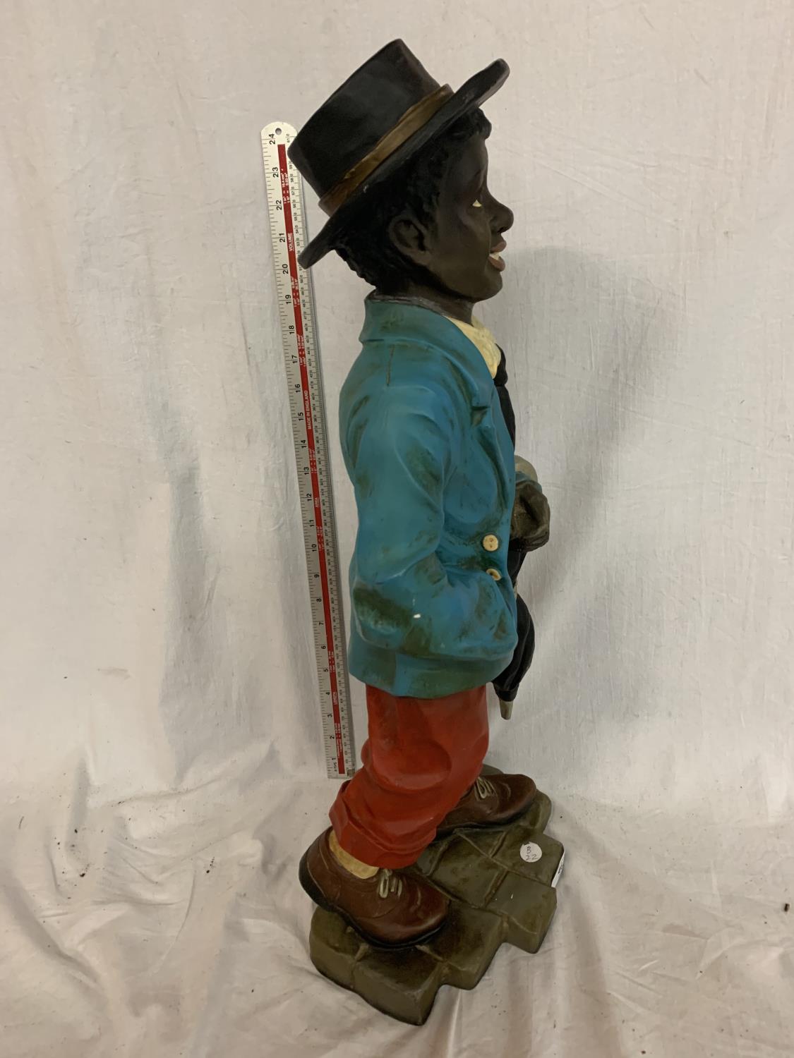 A FIGURE OF A BOY WITH UMBRELLA - Image 3 of 4