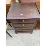 A STAG MINSTREL MAHOGANY CHEST OF FOUR DRAWERS