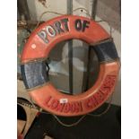 A LARGE VINTAGE STYLE WOODEN LIFE RING PORT OF LONDON CHELSEA