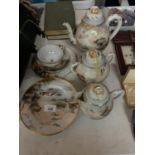 VARIOUS ITEMS OF ORIENTAL STYLE POTTERY TO INCLUDE TEAPOT, MILK JUG, SUGAR, PLATES, CUP ETC