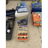 A POWERCRAFT ROUTER AND BOXED SET OF ROUTER BITS
