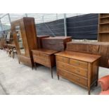 AN OAK WARDROBE WITH MATCHING DRESSING CHEST AND CHEST OF TWO SHORT AND TWO LONG DRAWERS