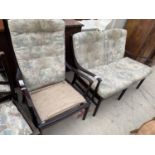 A PARKER KNOLL TWO SEATER SOFA AND ARMCHAIR