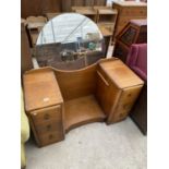 AN ART DECO STYLE OAK DRESSING TABLE WITH SIX DRAWERS AND CIRCULAR MIRROR