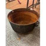 A LARGE VINTAGE CAULDRON