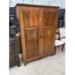 A MAHOGANY FITTED WARDROBE WITH TWO DOORS