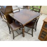 AN OAK DRAW LEAF TABLE AND FOUR CHAIRS