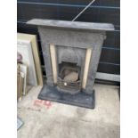 A VICTORIAN CAST IRON FIREPLACE