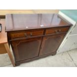 AN INLAID MAHOGANY CABINET WITH TWO DOORS AND TWO DRAWERS