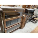 TWO "GUNN" MAHOGANY STACKING BOOKCASES EACH WITH THREE GLAZED UP AND OVER DOORS - TOGETHER WITH