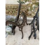 A SET OF CAST IRON BENCH ENDS