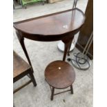 A MAHOGANY DEMI LUNE TABLE AND AN OAK STOOL