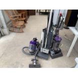 THREE VACUUM CLEANERS TO INCLUDE TWO DYSONS