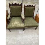 A PAIR OF VICTORIAN LADIES AND GENTS CARVED MAHOGANY PARLOUR CHAIRS
