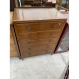 AN OAK CHEST OF FOUR DRAWERS