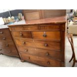 A VICTORIAN MAHOGANY CHEST OF THREE SMALL, TWO SHORT AND THREE LONG DRAWERS