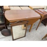 A TEAK DROP LEAF TABLE AND A SINGER SEWING MACHINE IN CABINET