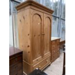 A VICTORIAN STYLE TWO DOOR PINE WARDROBE WITH SINGLE DRAWER TO BASE