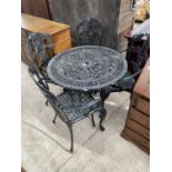 A CAST METAL GARDEN TABLE AND FOUR CHAIRS