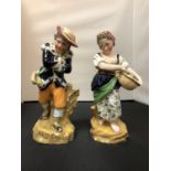 A PAIR OF CERAMIC FIGURINES